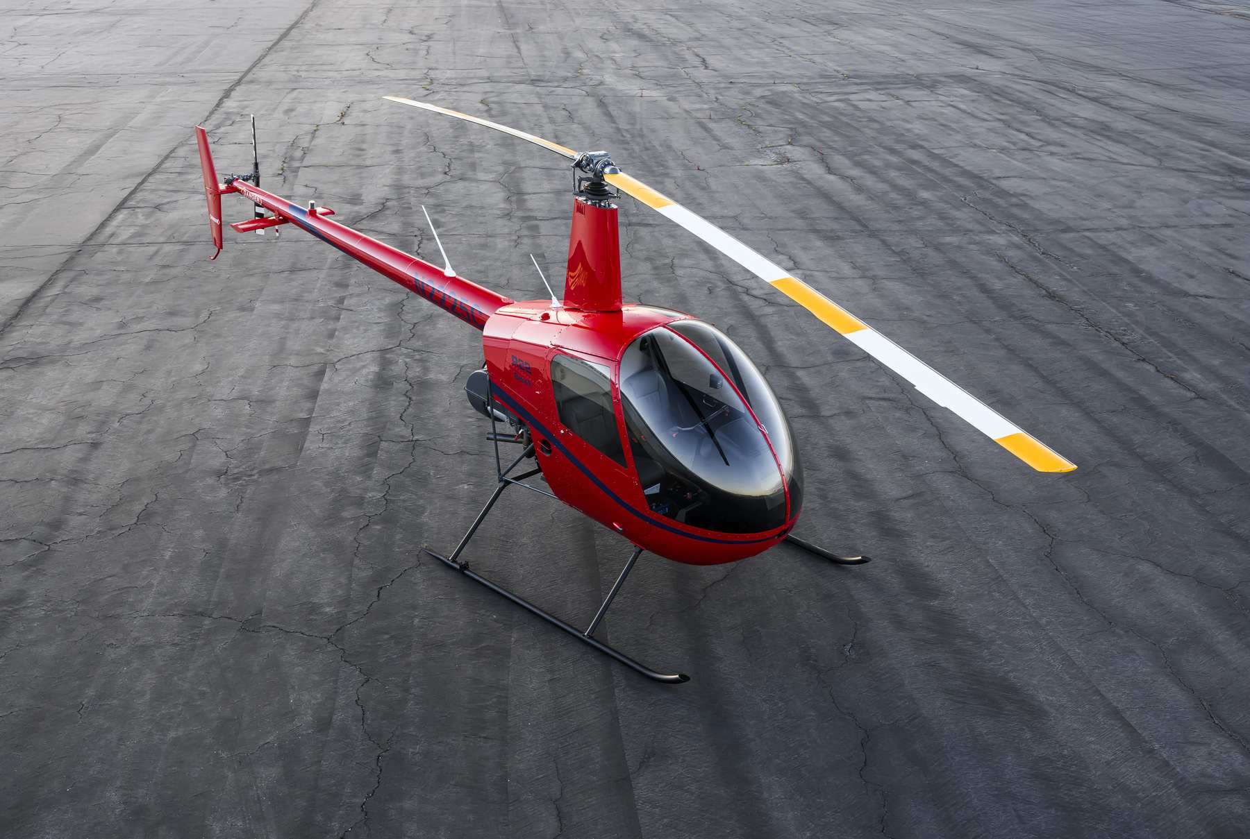 Red Robinson R22 Beta II on the ramp
