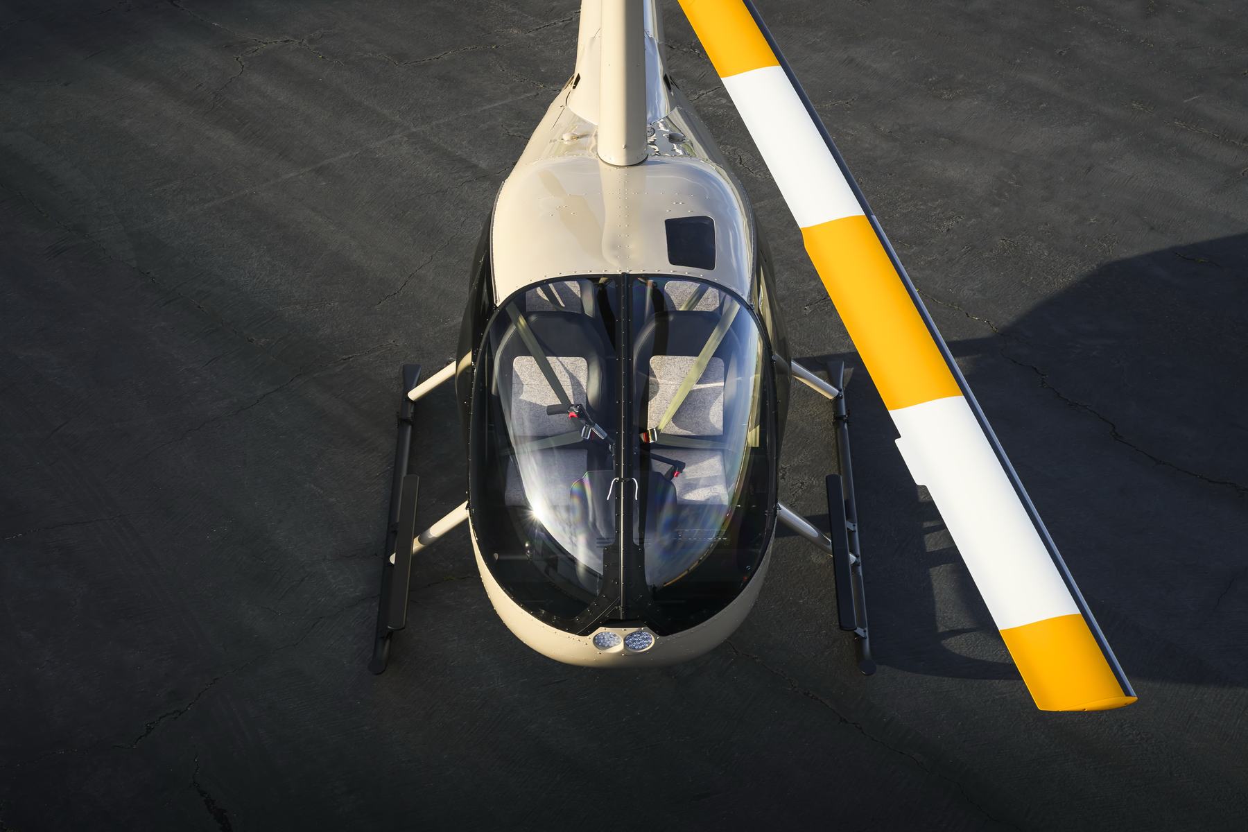 Green Robinson R44 Raven II on the ramp